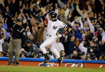 31 Oct 2001:  Derek Jeter #2 of the New York Yankees celebrates his game winning home run in the 11th inning against the Arizona Diamondbacks during game four of the Major League Baseball World Series at Yankee Stadium in New York, New York. The Yankees won 4-3. DIGITAL IMAGE. Mandatory Credit: Al Bello/ALLSPORT