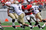 COLUMBUS, OH - SEPTEMBER 05:  Jermale Hines #7 of the Ohio State Buckeyes chases down quarterback Ricky Dobbs #4 of the Navy Midshipmen at Ohio Stadium on September 5, 2009 in Columbus, Ohio.  (Photo by Jamie Sabau/Getty Images)