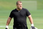 WESTMINSTER, MD - JULY 28:  Kelly Gregg #97 of the Baltimore Ravens walks off the field during training camp at McDaniel College on July 28, 2009 in Westminster, Maryland.  (Photo by Greg Fiume/Getty Images)