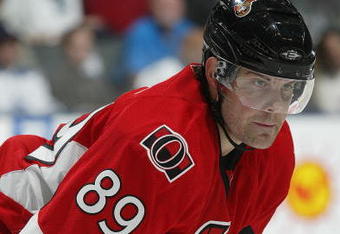 TORONTO - APRIL 11:  Mike Comrie #89 of the Ottawa Senators waits for a faceoff in a game against the Toronto Maple Leafs on April 11, 2009 at the Air Canada Centre in Toronto, Ontario. The Leafs defeated the Senators on the strength of a 3 goal performance by Boyd Devereaux #22. (Photo by Claus Andersen/Getty Images) 