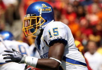 LOS ANGELES, CA - SEPTEMBER 05:  Running back Brandon Rutley #15 of the San Jose State Spartans  carries the ball against the USC Trojans at the Los Angeles Coliseum in Los Angeles, California.   USC won 56-3.  (Photo by Stephen Dunn/Getty Images)