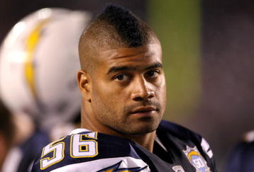 LOS ANGELES, CA - SEPTEMBER 05:  Linebacker Shawne Merriman #56 of the San Diego Chargers sits on the bench during the game with the San Francisco 49ers on September 4, 2009 at Qualcomm Stadium in San Diego, California. The Chargers won 26-7.  (Photo by Stephen Dunn/Getty Images)