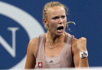 NEW YORK - SEPTEMBER 09:  Caroline Wozniacki of Denmark celebrates after a point against Melanie Oudin of the United States during day ten of the 2009 U.S. Open at the USTA Billie Jean King National Tennis Center on September 9, 2009 in the Flushing neighborhood of the Queens borough of New York City.  (Photo by Jim McIsaac/Getty Images)