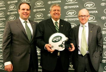 FLORHAM PARK, NJ - JANUARY 21: New York Jets Head Coach Rex Ryan (C) Owner Woody Johnson (R) and General Manager Mike Tannenbaum pose for a photo at a press conference naming Ryan as the new Head Coach of the New York Jets at the Atlantic Health Jets Training Center on January 21, 2009 in Florham Park, New Jersey.  (Photo by Andy Marlin/Getty Images)