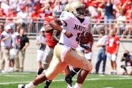 COLUMBUS, OH - SEPTEMBER 05: Quarterback Ricky Dobbs #4 of the Navy Midshipmen scores a touchdown against the Ohio State Buckeyes in the first quarter at Ohio Stadium on September 5, 2009 in Columbus, Ohio. (Photo by Jamie Sabau/Getty Images)