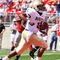 COLUMBUS, OH - SEPTEMBER 05:  Quarterback Ricky Dobbs #4 of the Navy Midshipmen scores a touchdown against the Ohio State Buckeyes in the first quarter at Ohio Stadium on September 5, 2009 in Columbus, Ohio.  (Photo by Jamie Sabau/Getty Images)