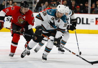 OTTAWA - FEBRUARY 26:  Patrick Marleau #12 of the San Jose Sharks carries the puck up ice while being pursued by Dany Heatley #15  of the Ottawa Senators in a game on February 26, 2009 at the Scotiabank Place in Ottawa, Canada. (Photo by Phillip MacCallum/Getty Images)
