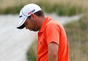 JERSEY CITY, NJ - AUGUST 29:  Sergio Garcia of Spain reacts after hitting out of the sand trap on the 12th hole during round three of The Barclays on August 29, 2009 at Liberty National in Jersey City, New Jersey.  (Photo by Kevin C. Cox/Getty Images)