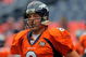 DENVER - AUGUST 30: Quarterback Kyle Orton #8 of the Denver Broncos warms up prior to facing the Chicago Bears during preseason NFL action at INVESCO Field at Mile High on August 30, 2009 in Denver, Colorado. The Bears defeated the Broncos 27-17. (Photo by Doug Pensinger/Getty Images)