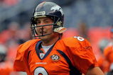 DENVER - AUGUST 30:  Quarterback Kyle Orton #8 of the Denver Broncos warms up prior to facing the Chicago Bears during preseason NFL action at INVESCO Field at Mile High on August 30, 2009 in Denver, Colorado. The Bears defeated the Broncos 27-17.  (Photo by Doug Pensinger/Getty Images)