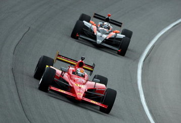 JOLIET, IL- AUGUST 28:  Graham Rahal, driver of the #02 McDonald's Racing Team Newman Hass Lanigan Racing Dallara Honda, drives in front of Robert Doornbos, driver of the #33 HVM Racing Dallara Honda, during practice for the IRL IndyCar Series PEAK Antifreeze & Motor Oil Indy 300 on August 28, 2009 at the Chicagoland Speedway in Joliet, Illinois.  (Photo by Donald Miralle/Getty Images)
