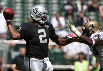 OAKLAND, CA - AUGUST 29:  Quarterback JaMarcus Russell #2 of the Oakland Raiders passes against the New Orleans Saints during an NFL preseason game at Oakland-Alameda County Coliseum on August 29, 2009 in Oakland, California.  (Photo by Jed Jacobsohn/Getty Images)