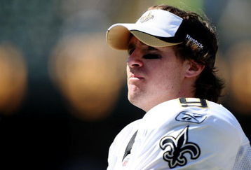 OAKLAND, CA - AUGUST 29:  Quarterback Drew Brees #9 of the New Orleans Saints looks on from the sideline during the preseason game against the Oakland Raiders at Oakland-Alameda County Coliseum on August 29, 2009 in Oakland, California. (Photo by Jed Jacobsohn/Getty Images)