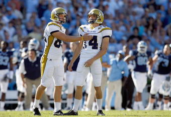 CHAPEL HILL, NC - NOVEMBER 08:  Andrew Smith #83 of the Georgia Tech Yellow Jackets congratulates Scott Blair #14 after his field goal kick during the game against the North Carolina Tar Heels at Kenan Stadium on November 8, 2008 in Chapel Hill, North Carolina.  (Photo by Kevin C. Cox/Getty Images)