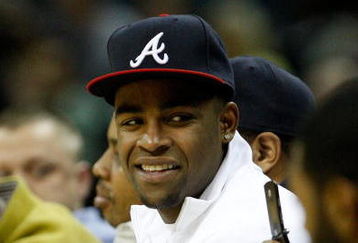 CHARLOTTE, NC - MARCH 03:  Former Texas Tech football player Michael Crabtree sits courtside during a game between the Chicago Bulls and Charlotte Bobcats at Time Warner Cable Arena on March 3, 2009 in Charlotte, North Carolina.  NOTE TO USER: User expressly acknowledges and agrees that, by downloading and/or using this Photograph, user is consenting to the terms and conditions of the Getty Images License Agreement.  (Photo by Streeter Lecka/Getty Images)