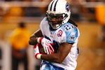 PITTSBURGH - SEPTEMBER 10:  Chris Johnson #28 of the Tennessee Titans runs the ball against the Pittsburgh Steelers during the game at Heinz Field on September 10, 2009 in Pittsburgh, Pennsylvania. (Photo by Scott Boehm/Getty Images)
