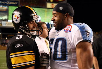 PITTSBURGH - SEPTEMBER 11: Jeff Reed #3 of the Pittsburgh Steelers is congratulated by David Thornton #50 of the Tennessee Titans after Reed scored the game winning field goal in overtime on September 11, 2009 at Heinz Field in Pittsburgh, Pennsylvania. The Steelers defeated the Titans 13-10 in overtime.  (Photo by Elsa/Getty Images)