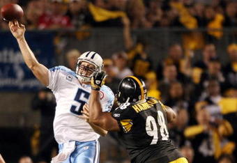 PITTSBURGH - SEPTEMBER 11:  Casey Hampton #98 of the Pittsburgh Steelers pressures Kerry Collins #5 of the Tennessee Titans on September 11, 2009 at Heinz Field in Pittsburgh, Pennsylvania. The Steelers defeated the Titans 13-10 in overtime.  (Photo by Elsa/Getty Images)