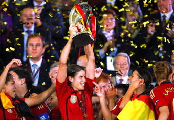 HELSINKI, FINLAND - SEPTEMBER 10:  The Germany players celebrate with the trophy after winning the UEFA Women's Euro 2009 Final match between England and Germany at the Helsinki Olympic Stadium on September 10, 2009 in Helsinki, Finland.  (Photo by Ian Walton/Getty Images)
