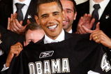 WASHINGTON - SEPTEMBER 10:  U.S. President Barack Obama is presented with a jersey from the Pittsburgh Penguins during an East Room event September 10, 2009 at the White House in Washington, DC. Obama hosted the Penguins to honor their 2009 Stanley Cup championship victory.  (Photo by Alex Wong/Getty Images)