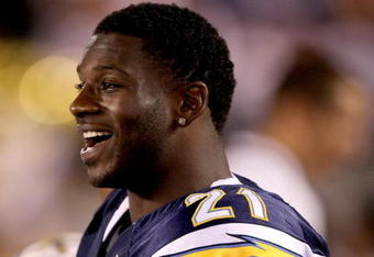 SAN DIEGO - SEPTEMBER 4: Running back LaDainian Tomlinson #21 of the San Diego Chargers laughs on th sidelines during the game with the San Francisco 49ers on September 4, 2009 at Qualcomm Stadium in San Diego, California.    (Photo by Stephen Dunn/Getty Images)