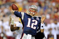 LANDOVER, MD - AUGUST 28:  Tom Brady #12 of the New England Patriots throws a touchdown to Randy Moss #81 (not pictured) in the first quarter of a preseason game against the Washington Redskins at FedExField on August 28, 2009 in Landover, Maryland.  (Photo by Greg Fiume/Getty Images)