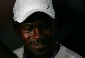 MONTEREY, CA - JULY 8:  NBA Hall of Famer Michael Jordan looks on during the practice session for the 2005 Red Bull U.S. Grand Prix,  part of the MotoGP World Championships, on July 8, 2005 at Mazda Raceway Laguna Seca in Monterey, California. Jordan owns his own AMA Superbike Team.  (Photo by Donald Miralle/Getty Images)