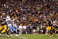 PITTSBURGH - SEPTEMBER 11:   Jeff Reed #3 of the Pittsburgh Steelers kicks the game winning field goal as Daniel Sepulveda #9 holds in overtime against the Tennessee Titans on September 11, 2009 at Heinz Field in Pittsburgh, Pennsylvania. The Steelers defeated the Titans 13-10 in overtime.  (Photo by Elsa/Getty Images)