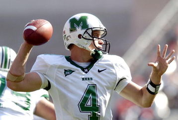 COLUMBUS, OH - SEPTEMBER 11:  Quarterback Stan Hill #4 of the Marshall Thundering Herd throws a pass against the Ohio State Buckeyes on September 11, 2004 at Ohio Stadium in Columbus, Ohio.  Ohio State defeated Marshall 24-21.   (Photo by David Maxwell/Getty Images)