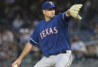 NEW YORK - JUNE 03:  Scott Feldman #39 of the Texas Rangers pitches against the New York Yankees on June 3, 2009 at Yankee Stadium in the Bronx borough of New York City.  (Photo by Nick Laham/Getty Images)