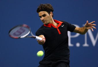 NEW YORK - SEPTEMBER 09:  Roger Federer of Switzerland returns a shot against Robin Soderling of Sweden during day ten of the 2009 U.S. Open at the USTA Billie Jean King National Tennis Center on September 9, 2009 in the Flushing neighborhood of the Queens borough of New York City.  (Photo by Chris McGrath/Getty Images)