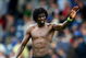 PORTSMOUTH, ENGLAND - AUGUST 30: Emmanuel Adebayor of Manchester City waves to the fans at the end of the Barclays Premier League match between Portsmouth and Manchester City at Fratton Park on August 30, 2009 in Portsmouth, England. (Photo by Phil Cole/Getty Images)