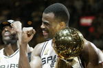 SAN ANTONIO, TX - JUNE 15:  David Robinson #50 and the San Antonio Spurs celebrate after winning Game six of the 2003 NBA Finals against the New Jersey Nets on June 15, 2003 at the SBC Center in San Antonio, Texas.  The Spurs won 88-77 and defeated the Nets to win the NBA Championship.  NOTE TO USER: User expressly acknowledges and agrees that, by downloading and/or using this Photograph, User is consenting to the terms and conditions of the Getty Images License Agreement.  (Photo by Jed Jacobsohn/Getty Images)