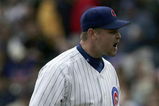 CHICAGO - MAY 18:  Kerry Wood #34 of the Chicago Cubs yells after giving up a home run in the 3rd inning to Alfonso Soriano of the Washington Nationals on May 18, 2006 at Wrigley Field in Chicago, Illinois.  (Photo by Jonathan Daniel/Getty Images)