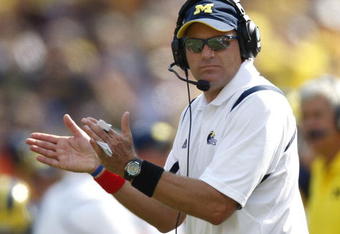 ANN ARBOR, MI - SEPTEMBER 05: Head coach Rich Rodriguez claps after a second quarter field goal against the Western Michigan Broncos vs. Michigan Wolverines on September 5, 2009 at Michigan Stadium in Ann Arbor, Michigan.  (Photo by Gregory Shamus/Getty Images)