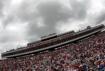 LOUDON, NH - JUNE 28:  Fans wait for the start of the NASCAR Sprint Cup Series LENOX Industrial Tools 301 under heavy rain clouds at New Hampshire Motor Speedway on June 28, 2009 in Loudon, New Hampshire.  (Photo by Chris Graythen/Getty Images)