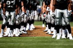 OAKLAND, CA - AUGUST 29: Member of the Oakland Raiders are introduced against the New Orleans Saints during an NFL preseason game at Oakland-Alameda County Coliseum on August 29, 2009 in Oakland, California.  (Photo by Jed Jacobsohn/Getty Images)