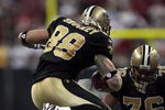HOUSTON - AUGUST 22:  Tight-end Jeremy Shockey #88 of the New Oreans Saints leaps over  linebacker Zach Diles #54 of the Houston Texans on August 22, 2009 in Houston, Texas.  (Photo by Bob Levey/Getty Images)