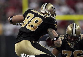 HOUSTON - AUGUST 22:  Tight-end Jeremy Shockey #88 of the New Oreans Saints leaps over  linebacker Zach Diles #54 of the Houston Texans on August 22, 2009 in Houston, Texas.  (Photo by Bob Levey/Getty Images)