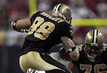 HOUSTON - AUGUST 22:  Tight-end Jeremy Shockey #88 of the New Oreans Saints leaps over  linebacker Zach Diles #54 of the Houston Texans on August 22, 2009 in Houston, Texas.  (Photo by Bob Levey/Getty Images)