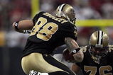 HOUSTON - AUGUST 22:  Tight-end Jeremy Shockey #88 of the New Oreans Saints leaps over  linebacker Zach Diles #54 of the Houston Texans on August 22, 2009 in Houston, Texas.  (Photo by Bob Levey/Getty Images)