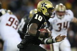 NASHVILLE, TN - DECEMBER 31:  Larry Smith #10 of the Vanderbilt Commodores carries the ball against the Boston College Eagles during the Gaylord Hotels Music City Bowl at LP Field on December 31, 2008 in Nashville, Tennessee.  (Photo by Andy Lyons/Getty Images)