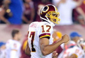 LANDOVER, MD - AUGUST 28:  Jason Campbell #17 of the Washington Redskins celebrates after a long completion during a preseason game against the New England Patriots at FedExField on August 28, 2009 in Landover, Maryland.  (Photo by Greg Fiume/Getty Images)