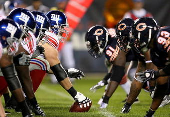 CHICAGO - AUGUST 22: The offensive line of the New York Giants waits to take on the defensive line of the Chicago Bears during a pre-season game on August 22, 2009 at Soldier Field in Chicago, Illinois. The Bears defeated the Giants 17-3. (Photo by Jonathan Daniel/Getty Images)