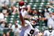 OAKLAND, CA - AUGUST 29: Quarterback Drew Brees #9 of the New Orleans Saints passes during the preseason game against the Oakland Raiders at Oakland-Alameda County Coliseum on August 29, 2009 in Oakland, California. (Photo by Jed Jacobsohn/Getty Images)