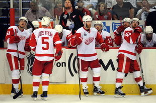 PITTSBURGH - JUNE 09:  Valtteri Filppula #51, Nicklas Lidstrom #5, Daniel Cleary #11 and Darren Helm #43 of the Detroit Red Wings look on from the bench while playing against the Pittsburgh Penguins during Game Six of the NHL Stanley Cup Finals at the Mellon Arena on June 9, 2009 in Pittsburgh, Pennsylvania.  (Photo by Harry How/Getty Images)