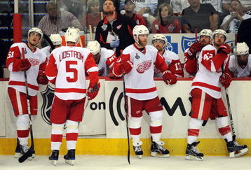 PITTSBURGH - JUNE 09:  Valtteri Filppula #51, Nicklas Lidstrom #5, Daniel Cleary #11 and Darren Helm #43 of the Detroit Red Wings look on from the bench while playing against the Pittsburgh Penguins during Game Six of the NHL Stanley Cup Finals at the Mellon Arena on June 9, 2009 in Pittsburgh, Pennsylvania.  (Photo by Harry How/Getty Images)