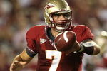 TALLAHASSEE, FL - SEPTEMBER 07: Quarterback Christian Ponder #7 of the Florida State Seminoles pitches the ball on an option play during action against the Miami Hurricanes at Doak Campbell Stadium on September 7, 2009 in Tallahassee, Florida.  (Photo by Doug Benc/Getty Images)