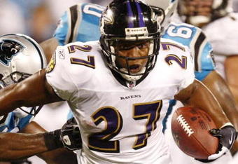 CHARLOTTE, NC - AUGUST 29: Running back Ray Rice #27 of the Baltimore Ravens breaks the tackle of linebacker James Anderson #50 the Carolina Panthers during their preseason game at Bank of America Stadium on August 29, 2009 in Charlotte, North Carolina. (Photo by Streeter Lecka/Getty Images)