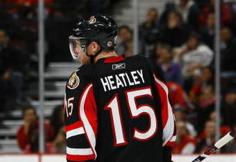 OTTAWA - MARCH 11:  Jason Spezza #19 and Dany Heatley #15 of the Ottawa Senators stand on the ice during the game against the Tampa Bay Lightning on March 11, 2009 at the Scotiabank Place in Ottawa, Ontario, Canada. (Photo by Phillip MacCallum/Getty Images)